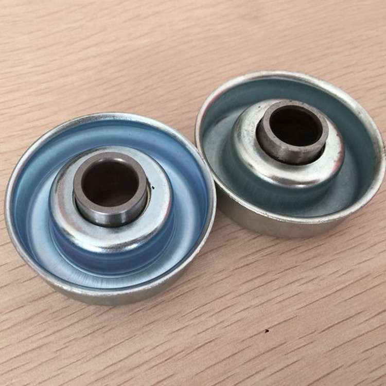 Gravity conveyor roller steel bearing end cap